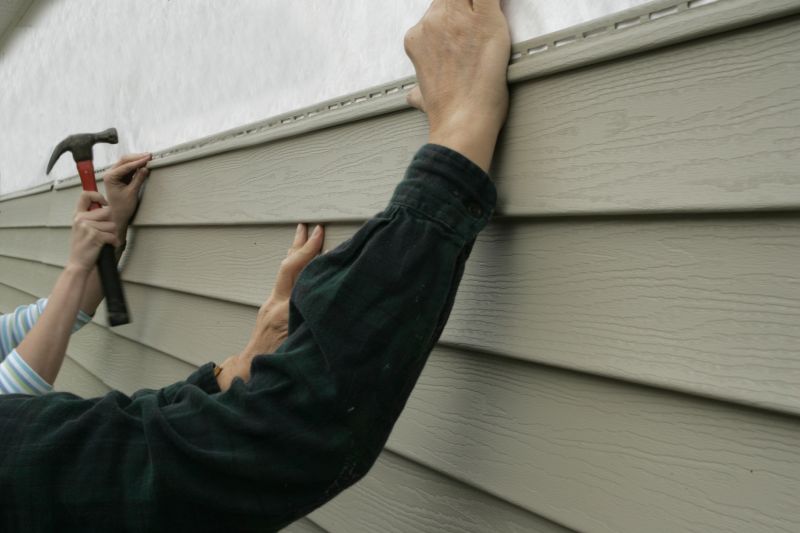 Applying Insulation Under Siding